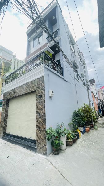 BÁN NHÀ CĂN GÓC 2 MẶT TIỀN ĐƯỜNG PHÚ THUẬN QUẬN 7